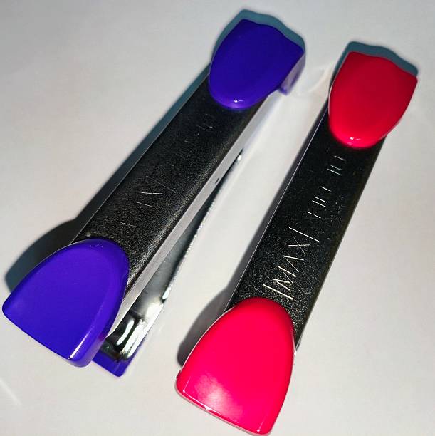 istock Two Staplers Red and Blue Office Supplies 2224197931