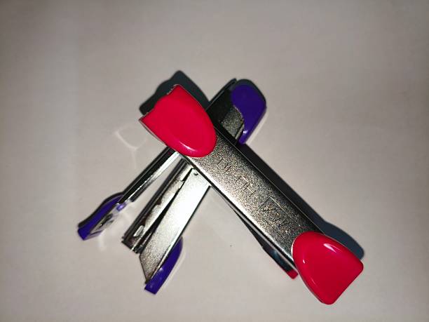 A stapler is a tool used to clamp or join paper using staples.