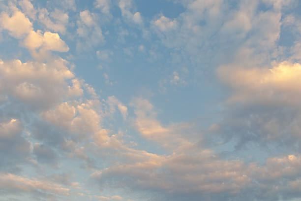 istock Soft Colorful Clouds at Peaceful Sunset Sky 2224198567