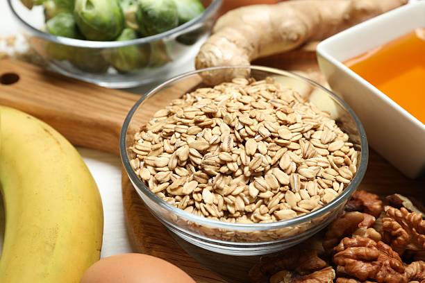 istock Different fresh products rich in melatonin on white table, closeup 2224210665
