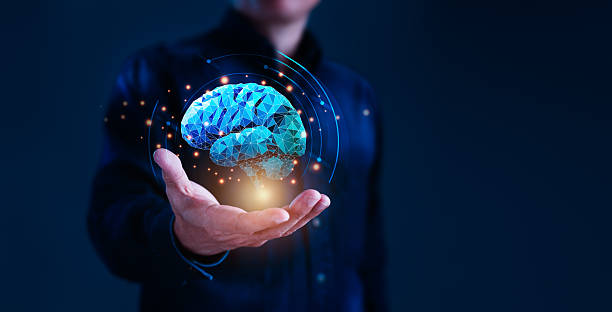 istock Man Holding Glowing Blue Brain, Concept of Innovation and Future 2224215065