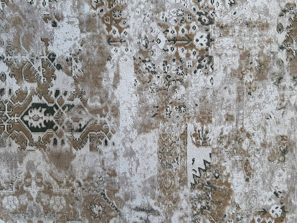 istock Softly worn backdrop creates elegant vintage feel, perfect for subtle and sophisticated design layers. Faded vintage background with soft gray, brown, and white colors, subtle cracks. 2224219075