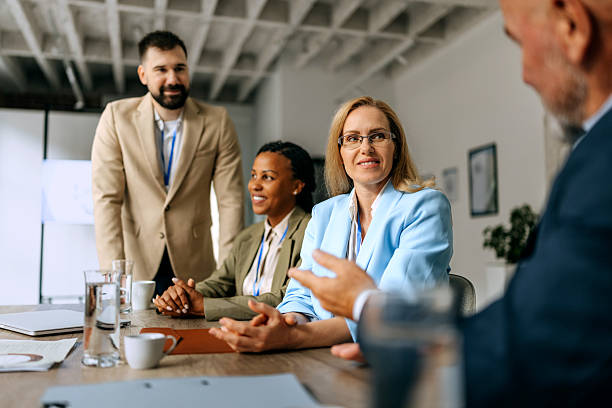 istock Diverse business team having formal meeting 2224220612