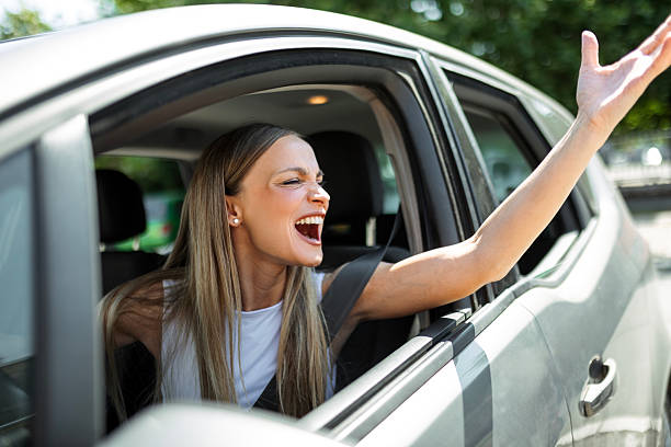istock Angry Female Driver Experiencing Rush Hour Stress 2224225180