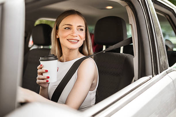 istock offee in Hand, Eyes on the Road 2224225195