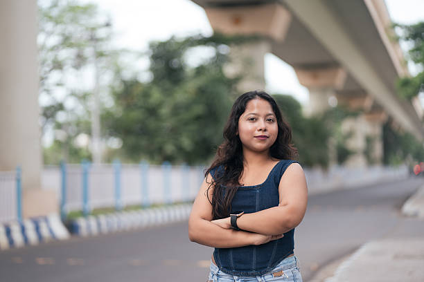 istock Urban Confidence: Young Woman Posing with Determination 2224231598