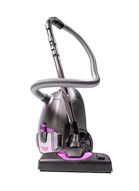 Woman vacuuming dust