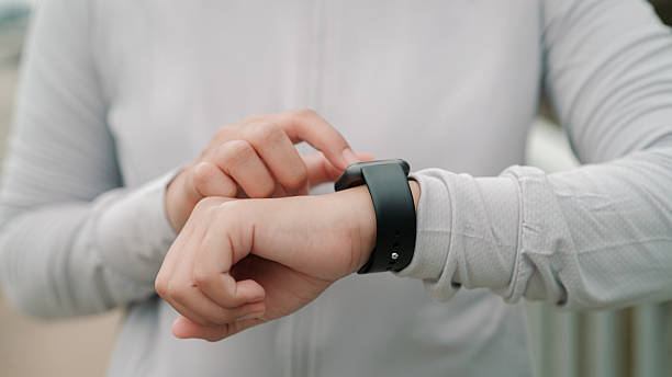 istock Asian woman using smart watch while exercise in the city 2224233317