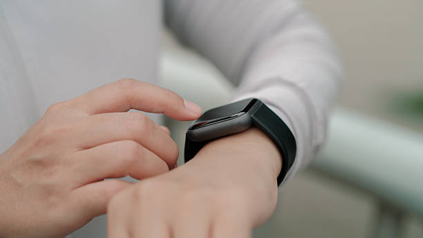 istock Asian woman using smart watch while exercise in the city 2224233457