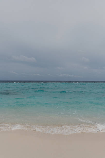 istock blue water background, blue ocean water and white beach in Maldives 2224234687