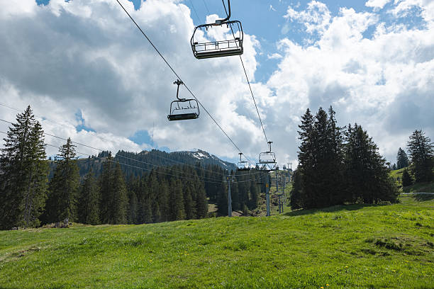 istock Two empty and unoccupied ski lift during summer, Chatzenberg, Swiss Alps. 2224236195