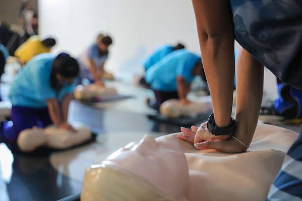 istock A person performs CPR chest compressions on a during a training session, highlighting essential life-saving techniques and emergency preparedness. 2224236444