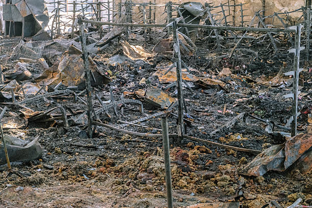 Burnt metal shelves of a store devastated by fire