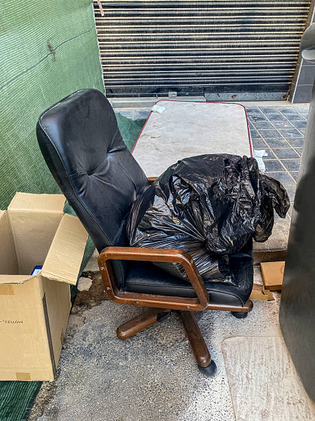 istock Office chair abandoned in the street 2224240841