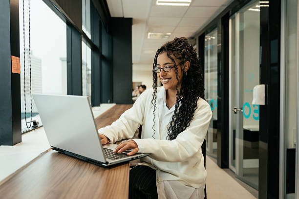istock Latina woman working on a laptop in the office 2224251921