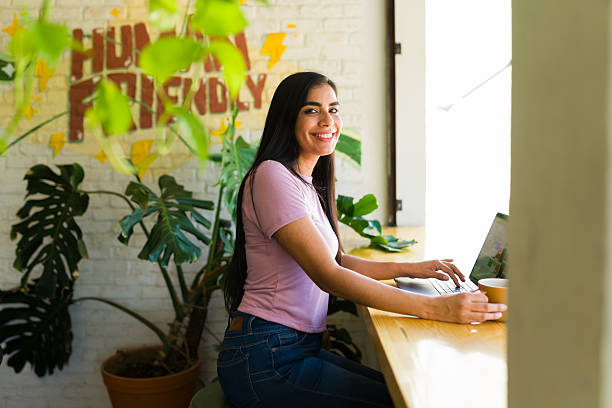 istock Woman working remotely in a trendy coffee shop 2224255640