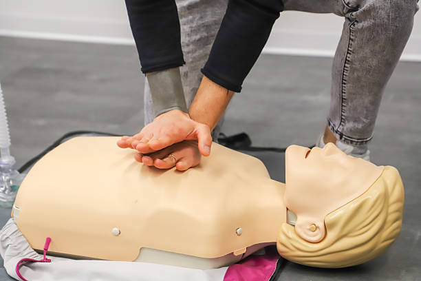 istock first aid course - company safety - cardiac massage - Basic Life Support 2224256185