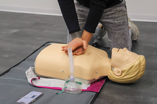 istock first aid course - company safety - cardiac massage - Basic Life Support 2224256188