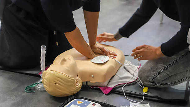 istock first aid course - company safety - cardiac massage - Basic Life Support 2224256195