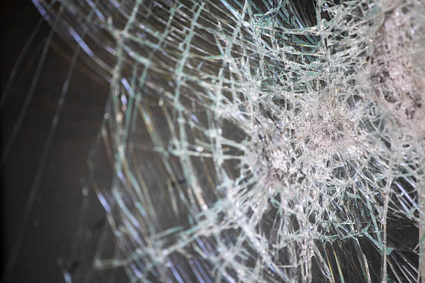 istock Close-up of a broken glass window 2224264942