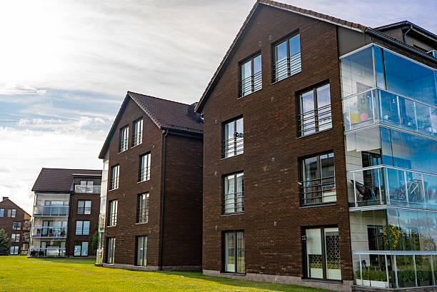 istock Modern apartment building with large glass windows and balconies. 2224265783
