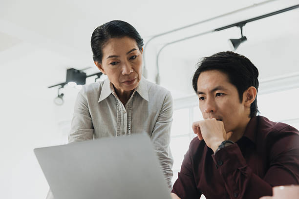 istock Team members collaborating on a project in a modern office space during the afternoon 2224271502