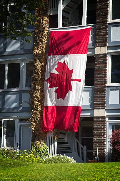 istock Canadian Flag Displayed on Building 2224273277