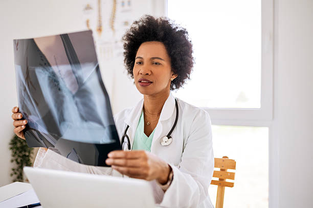 istock Confident Woman Physician Analyzing Medical X-Ray in Office 2224275383
