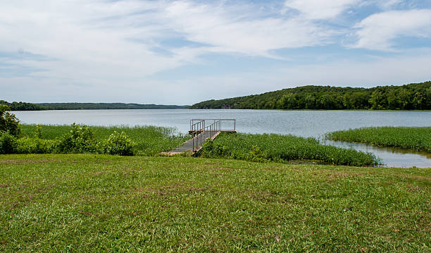 istock Pathway to lakeside fishing dock 2224275736