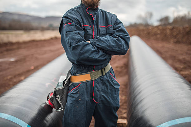 istock Unrecognizable heavy machinery worker standing with crossed arms 2224276370