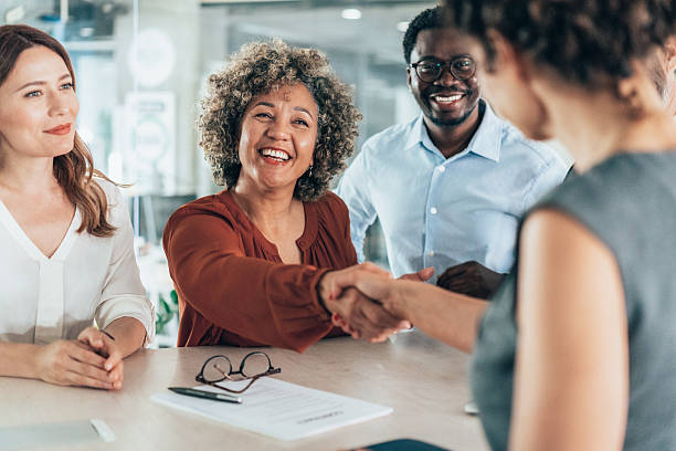 istock Shaking hands with new colleague 2224284067