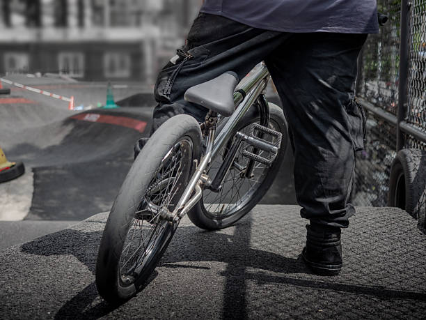 Red reflector attached to bicycle wheel spokes