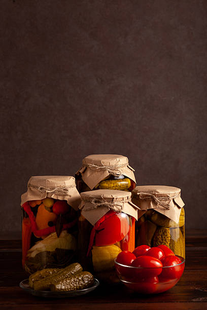 istock Traditional winter preserves with fresh garlic and spices 2224290792