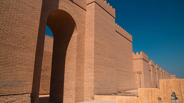 istock Ancient ruins of Babylon showcase impressive brick walls under clear blue sky 2224293823