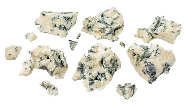 istock Flying Blue Cheese pieces isolated on white. High-Quality Levitating Blue cheese slices. Mold Cheese Explosion. Top view. Flat lay. 2224293854