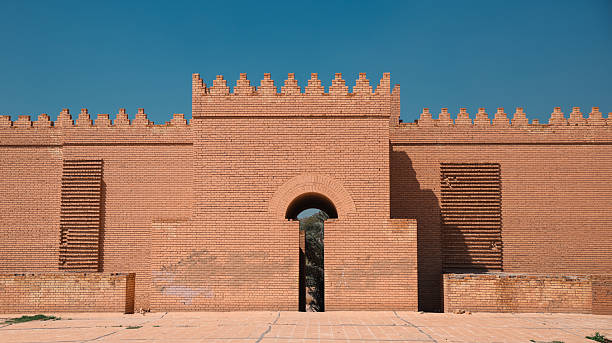 istock Historic gateway of ancient Babylon showcasing intricate brickwork under clear blue sky 2224293940