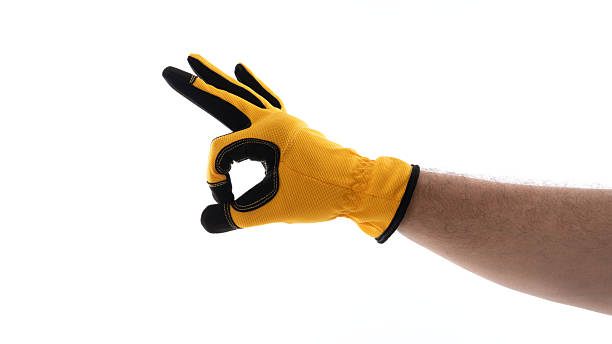 istock Hand gesture showing okay sign with work glove 2224294374