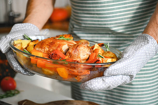 istock mature adult man prepares festive dinner 2224295824