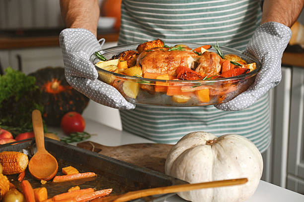 istock mature adult man prepares festive dinner 2224296033