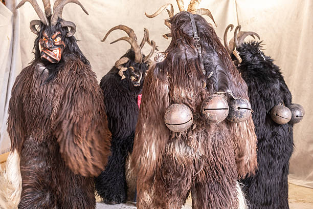 istock Traditional festivities feature costumed figures representing folklore in rural community celebration 2224297652