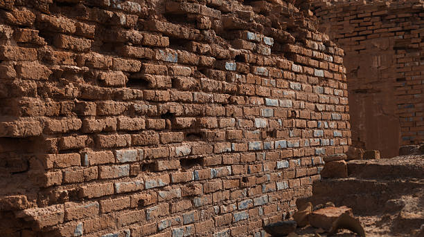 istock Exploring ancient brick walls at historical site in Iraq during sunny daylight hours 2224300632