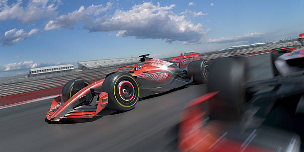istock Racing Car Moving Fast Past Teammate Around Corner 2224303401