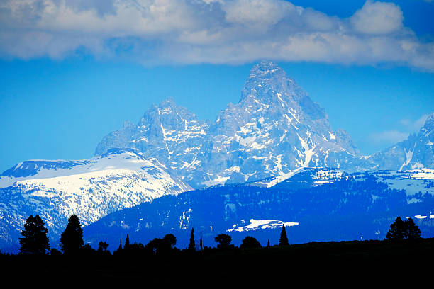 Grand Teton Mountains from Oxbow Bend on the Snake River at sunrise. Grand Teton National Park, Wyoming, USA