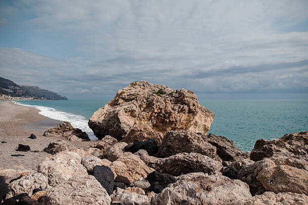 istock Rocky Beach with Boulders and Calm Sea 2224308441