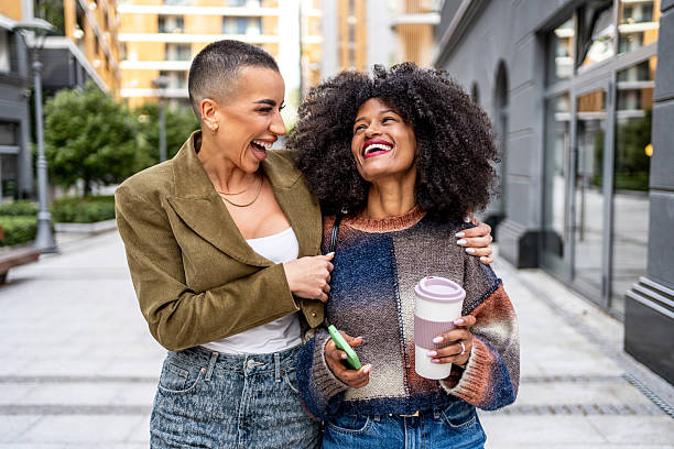 istock Joyful young adults enjoying city stroll together 2224311936
