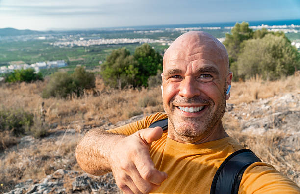 istock Man taking a selfie on a hiking journey. 2224315327