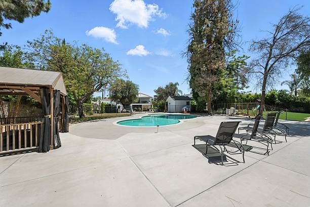 istock Private Ranch-Style Home with Pool, Mature Landscaping, and Modern Light Interiors 2224317922