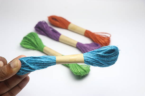 istock Natural jute thread twine of different colors on a white background. Multicolor jute threads 2224320621