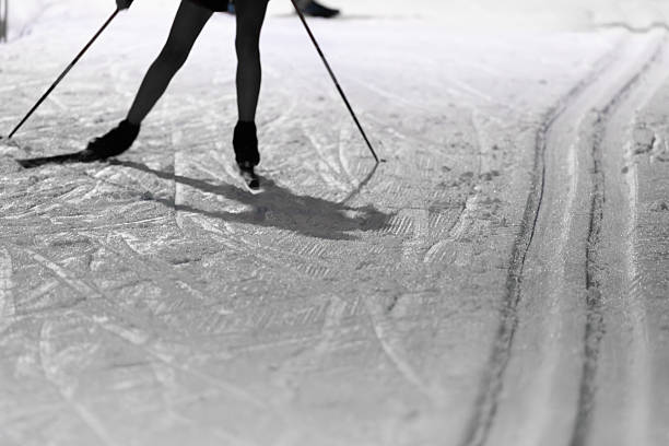 istock Cross-Country Skiing Activity on a Snow-Covered Winter Path with Tracks Visible 2224324788