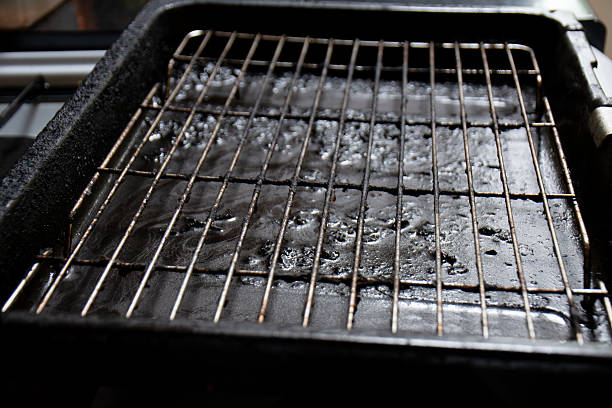 istock dirty grill with black grease 2224324868